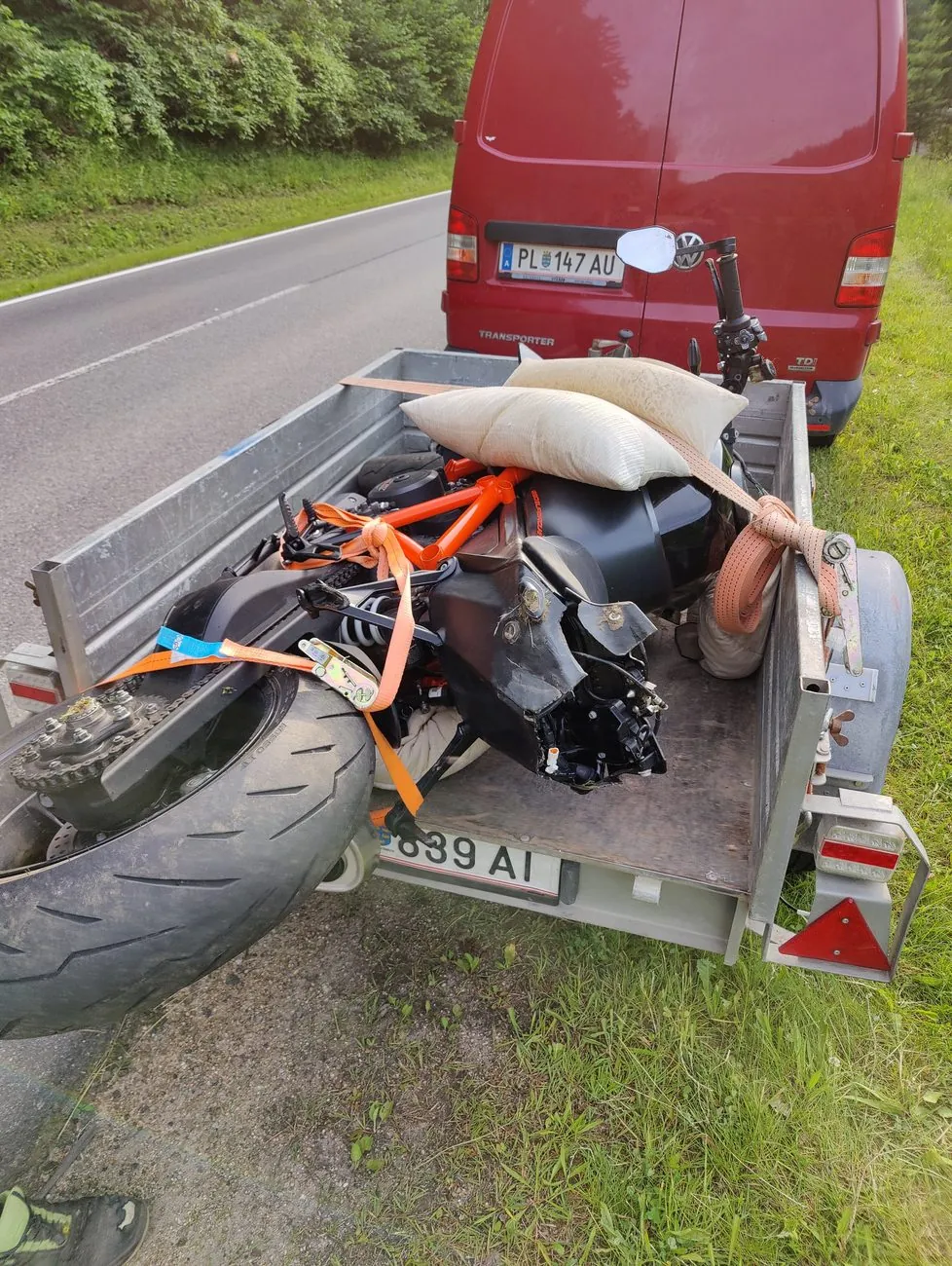 Damaged motorcycle after a 60 km/h T-bone crash